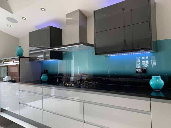 Blue glass kitchen splashback